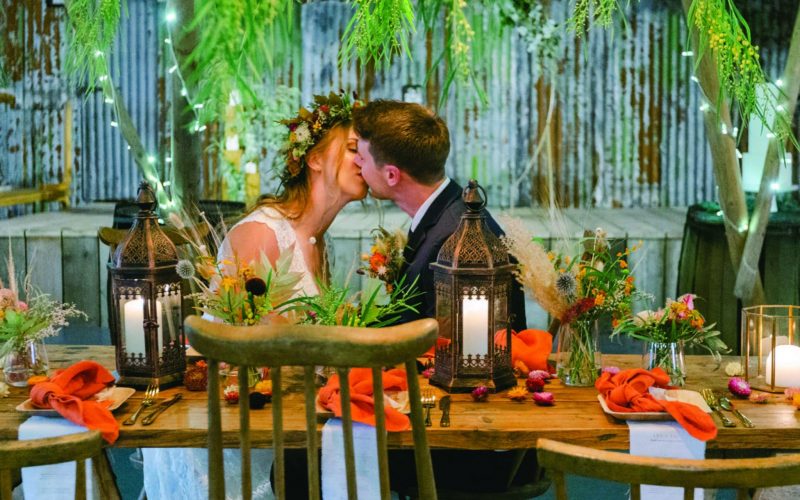 Wedding Couple at Table Image